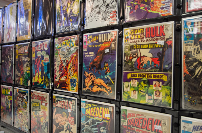Stack of comic books with price tags