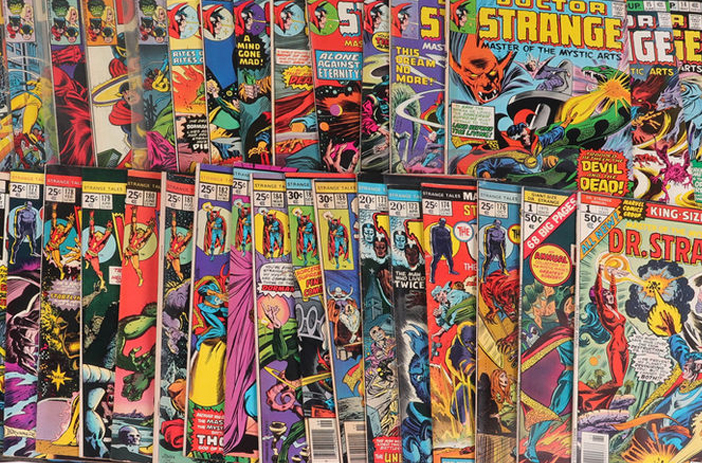 Bronze Age comic books stacked together