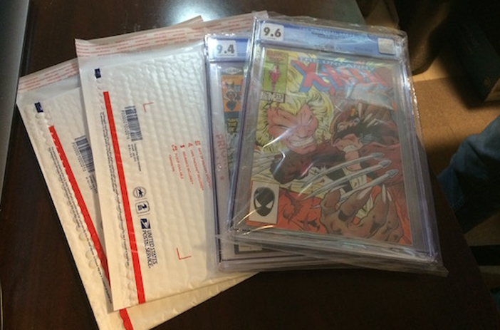 Comic books carefully packed in protective box