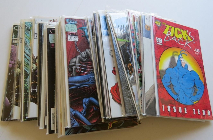 Stacked comic books bundled for bulk sale
