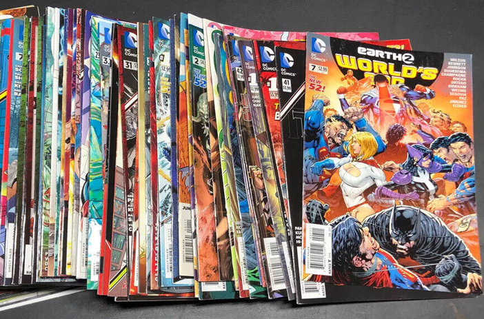 Person sorting through individual comic books