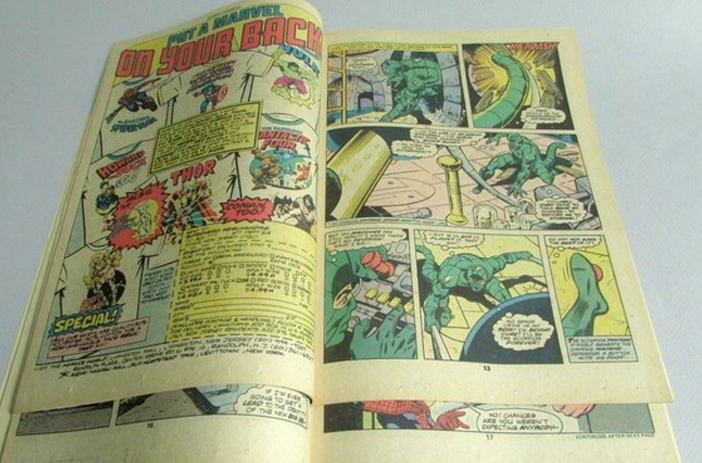 Damaged comic book with torn cover