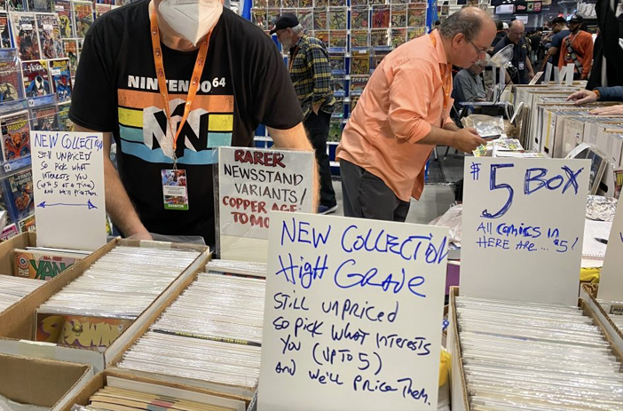 Comic book convention vendor booth setup