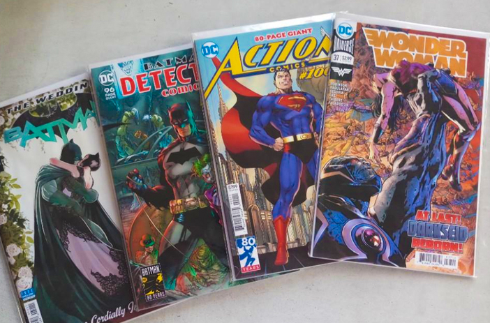 Comic books spread out individually for sale