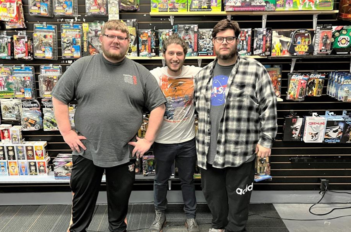 Comic book store reseller examining collection