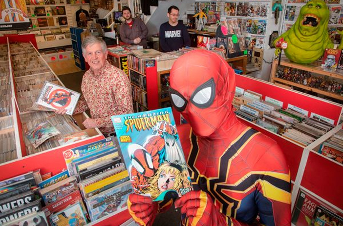 Comic books with stock market graph overlay