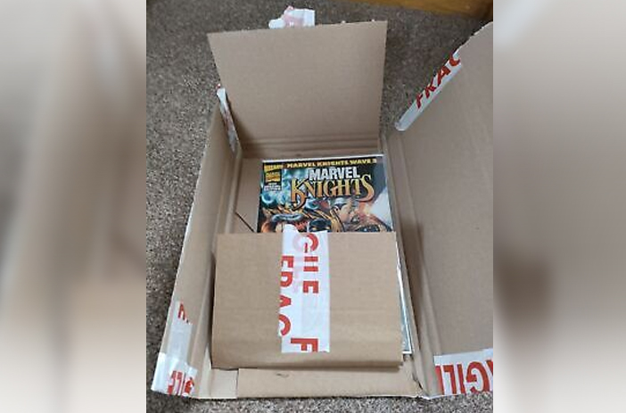 Damaged comic book with torn cover
