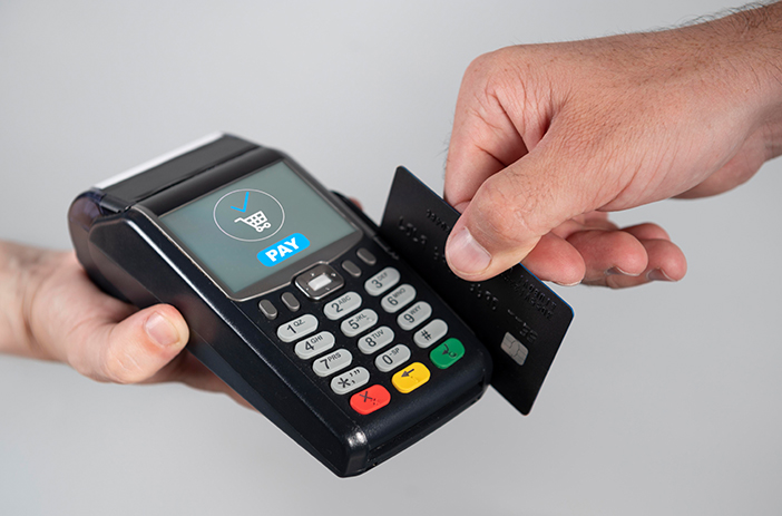 Vendor accepting card payment at booth