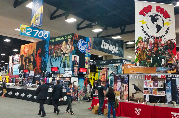 Colorful comic book display at convention booth
