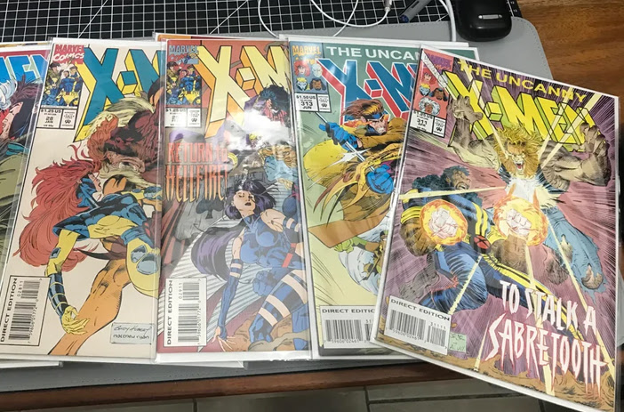 Counterfeit comic books side by side comparison