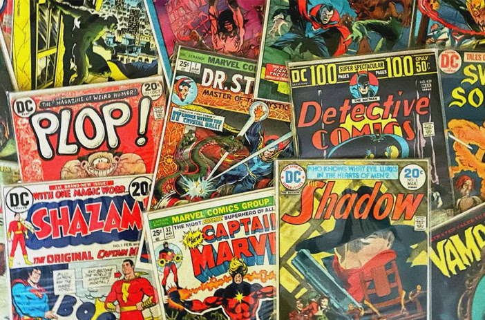 Vintage comic books stacked in a pile