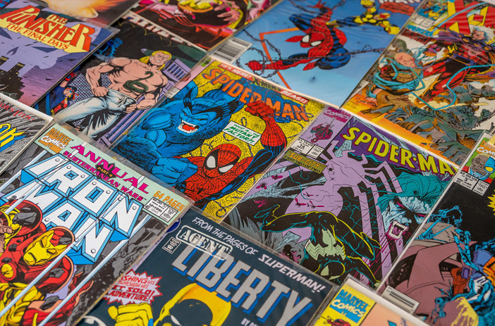 Stacked comic books on printing press